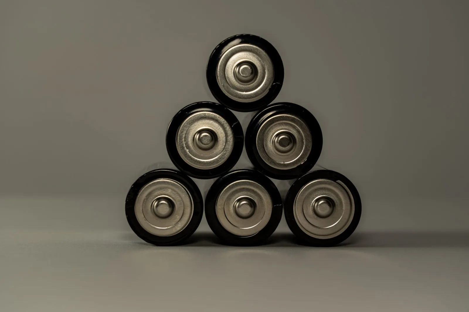 Lithium-ion battery pack removed from a robot lawn mower for inspection on a workbench
