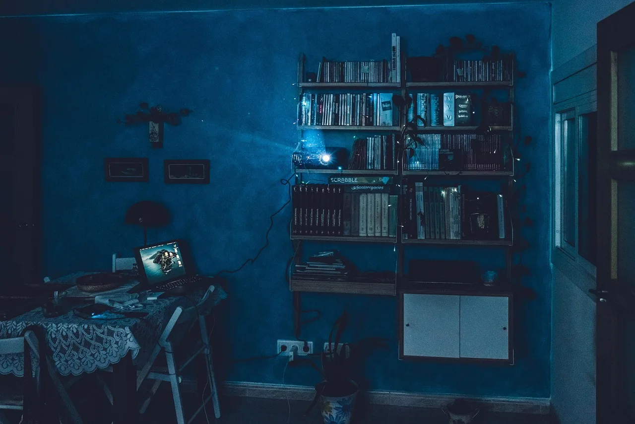 Home WiFi router with indicator lights sitting on a shelf indoors