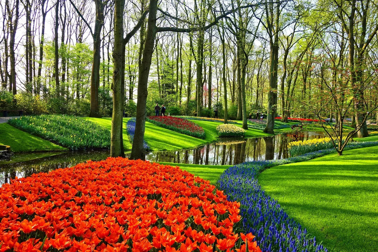 Flower bed with a neat brick border separating it from the lawn